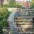 A natural setting for this flagstone stairway and walls with landscaping at a private residence. 
 